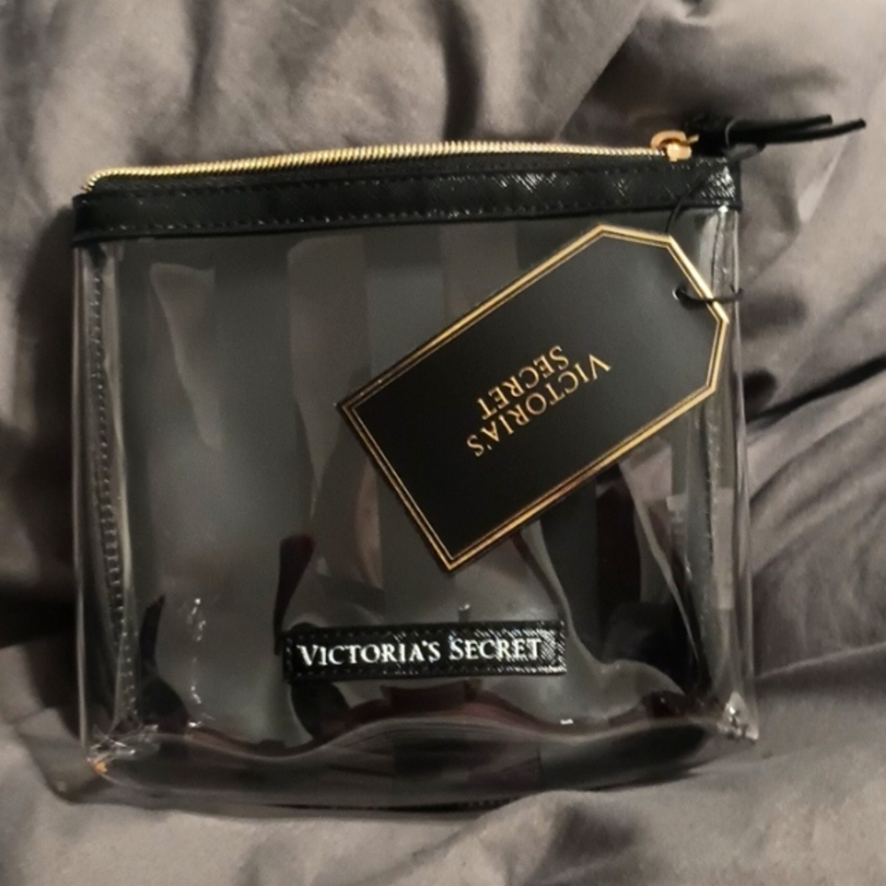 Victoria's Secret makeup bag. Clear black bag. Classic black stripes. Brand new.